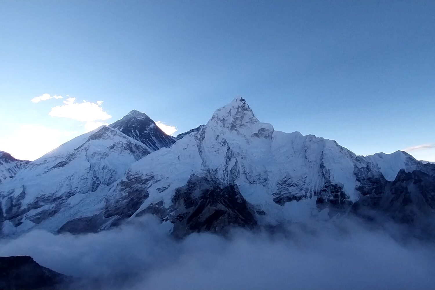 Panoramic view of Everest Base Camp featuring glaciers, rugged terrain, and majestic Himalayan vistas.