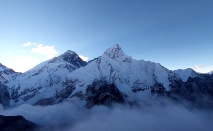 Panoramic view of Everest Base Camp featuring glaciers, rugged terrain, and majestic Himalayan vistas.
