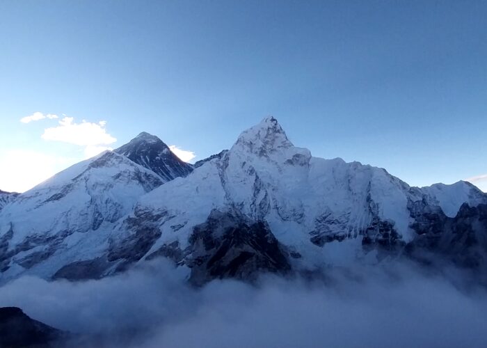Panoramic view of Everest Base Camp featuring glaciers, rugged terrain, and majestic Himalayan vistas.